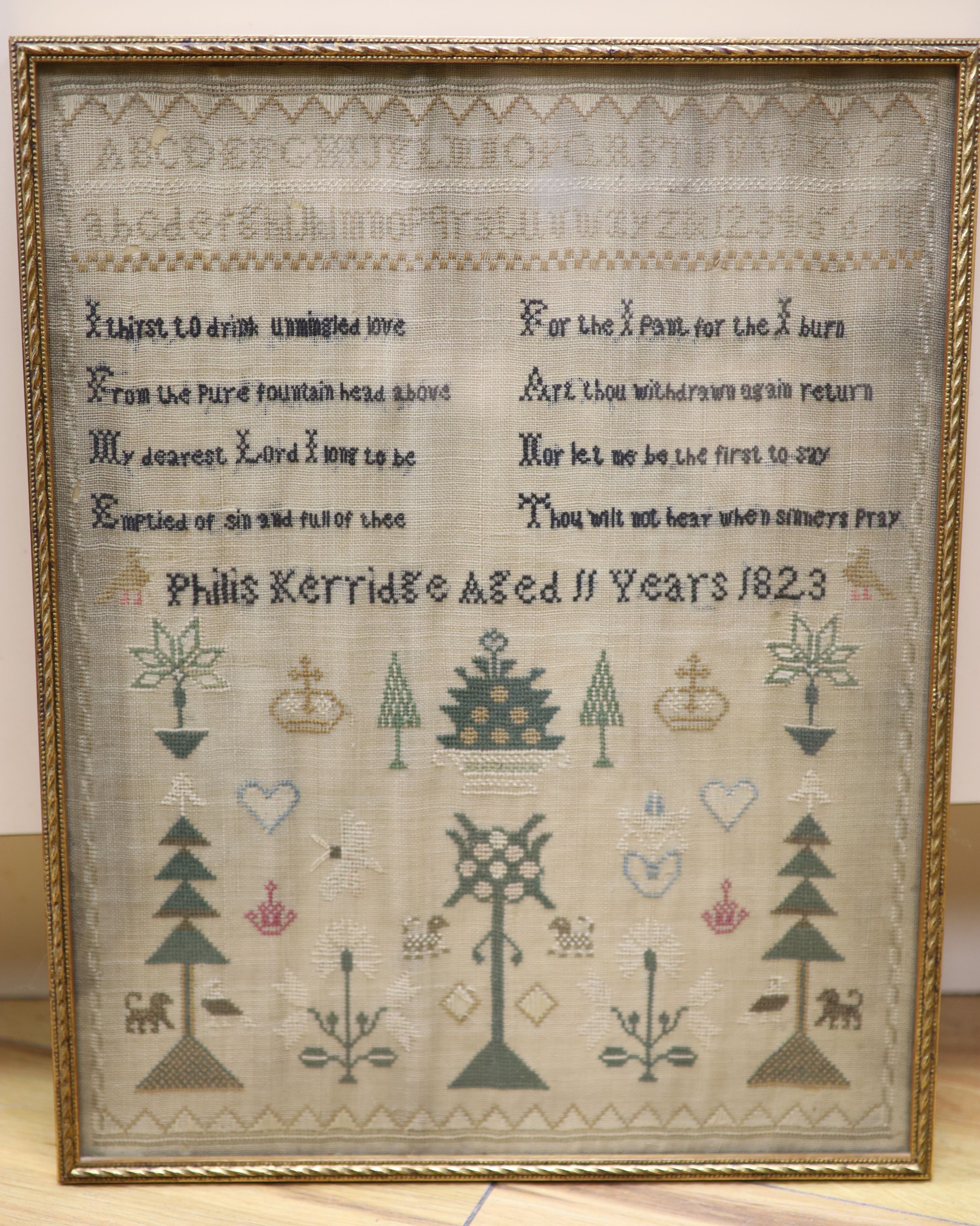 A 19th century framed sampler, dated 1823, 41 x 32cm